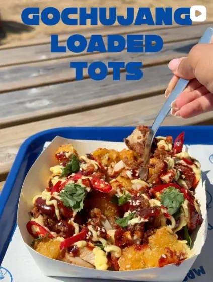 Loaded tots with sauces and herbs